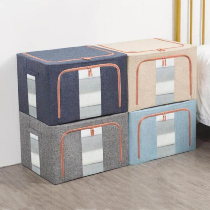 Large foldable storage box for clothes and blankets in grey, navy, beige and blue color.