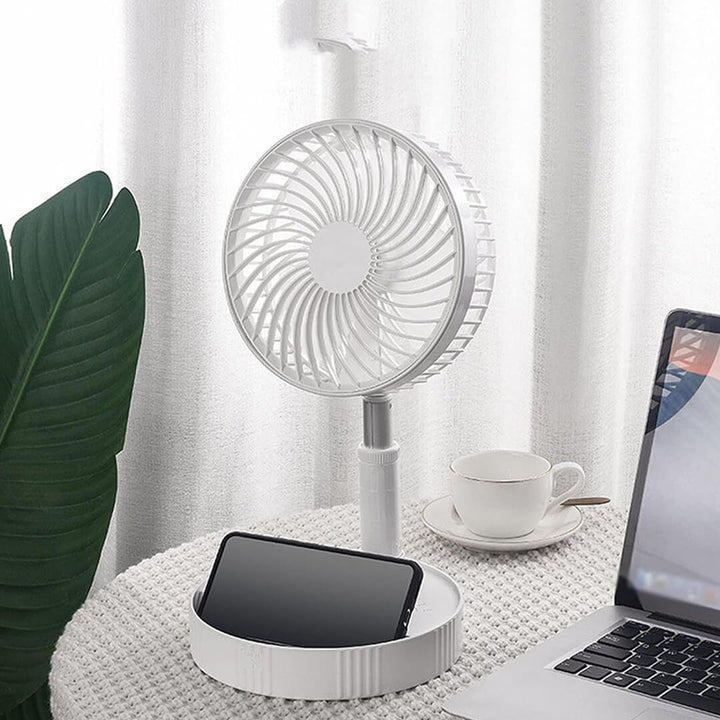 Foldable portable pedestal fan with adjustable height and phone holder