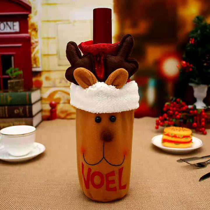 Decorative festive bottle with reindeer design and noel text on it