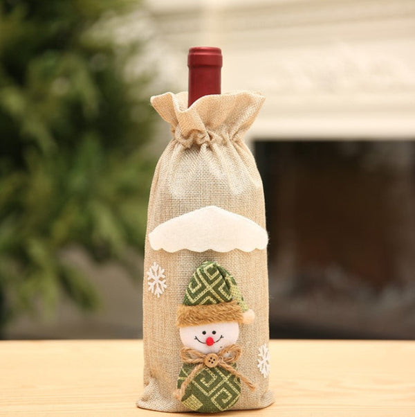 Bottle wrapped in a snowman linen beige bag