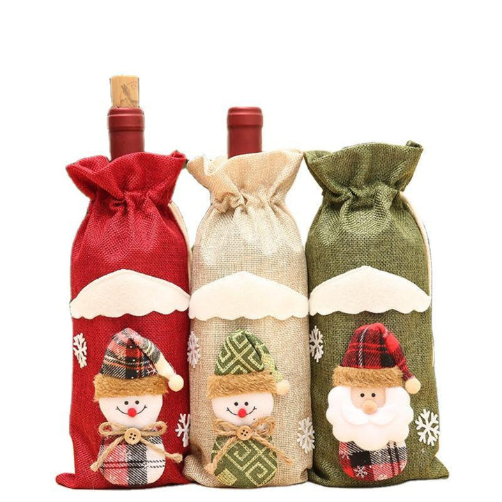 Red, green and beige Christmas-themed bottle bag set with drawstrings