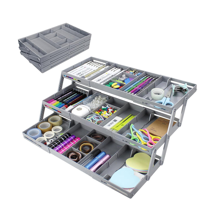 Gray three-tiered organizer with stationery items 
