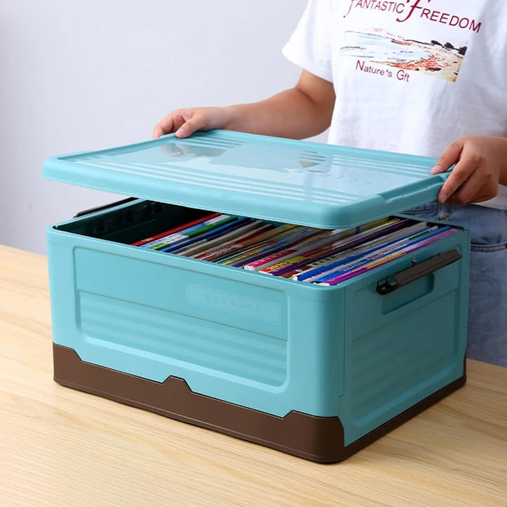 Stackable teal plastic storage box for books storage.