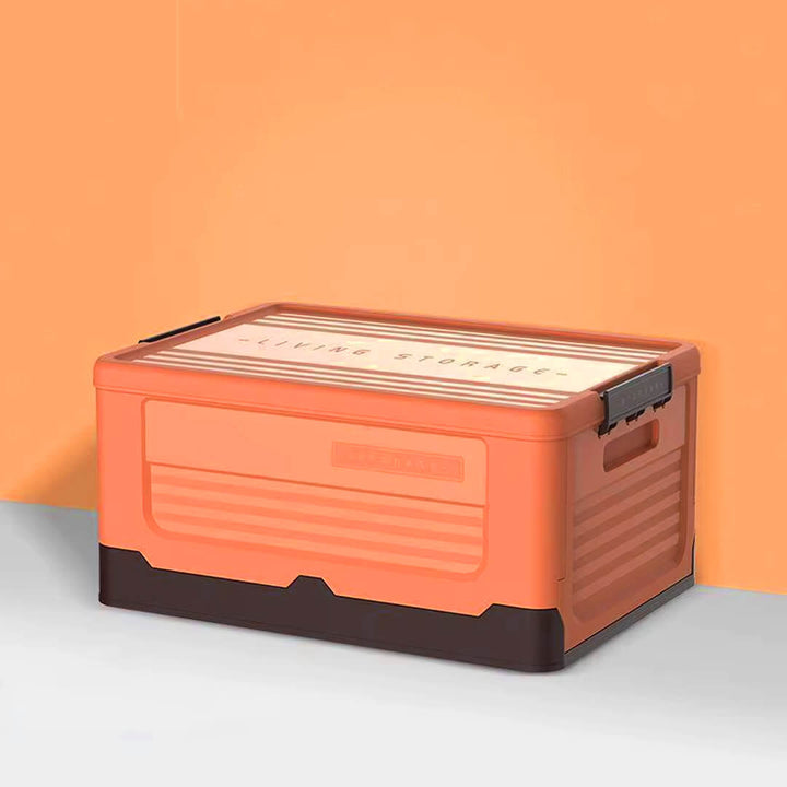 Durable orange plastic storage box with secure lid and handles.