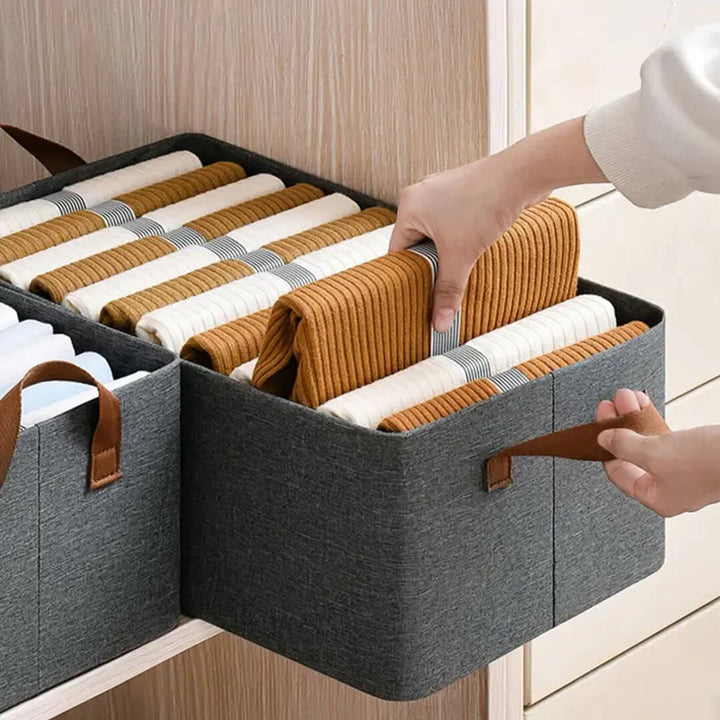 Stack of collapsible storage boxes for closet organization