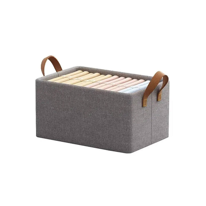 Stackable fabric storage boxes holding folded shirts