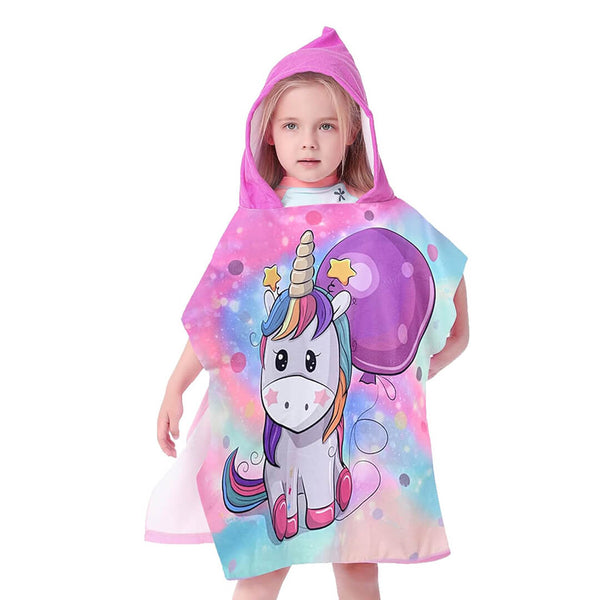 Girl wearing the Microfiber hooded beach towels purple unicorn design, front shot