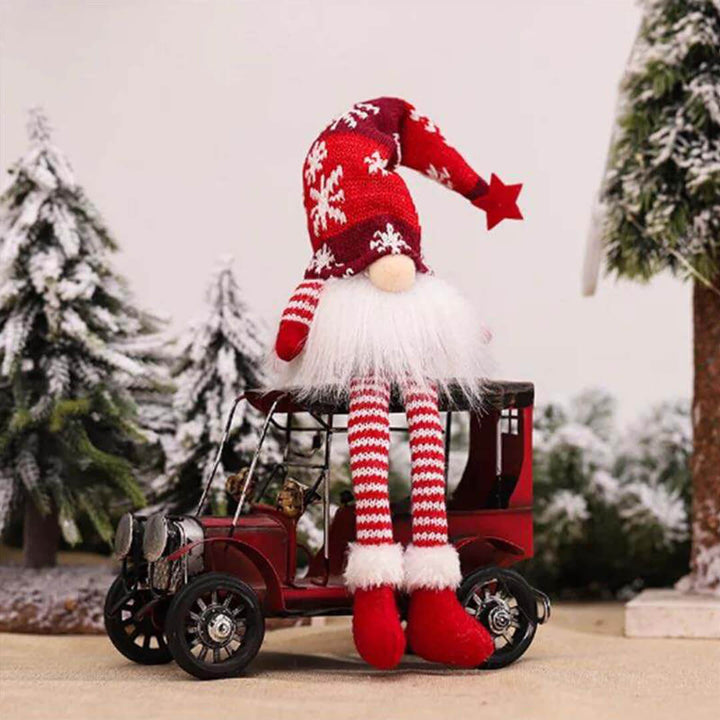 Red Christmas gnome decoration with dangling legs