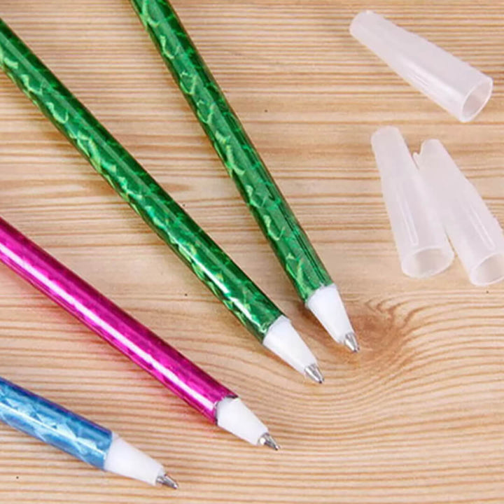 Christmas ballpoint pens in red, pink and blue color