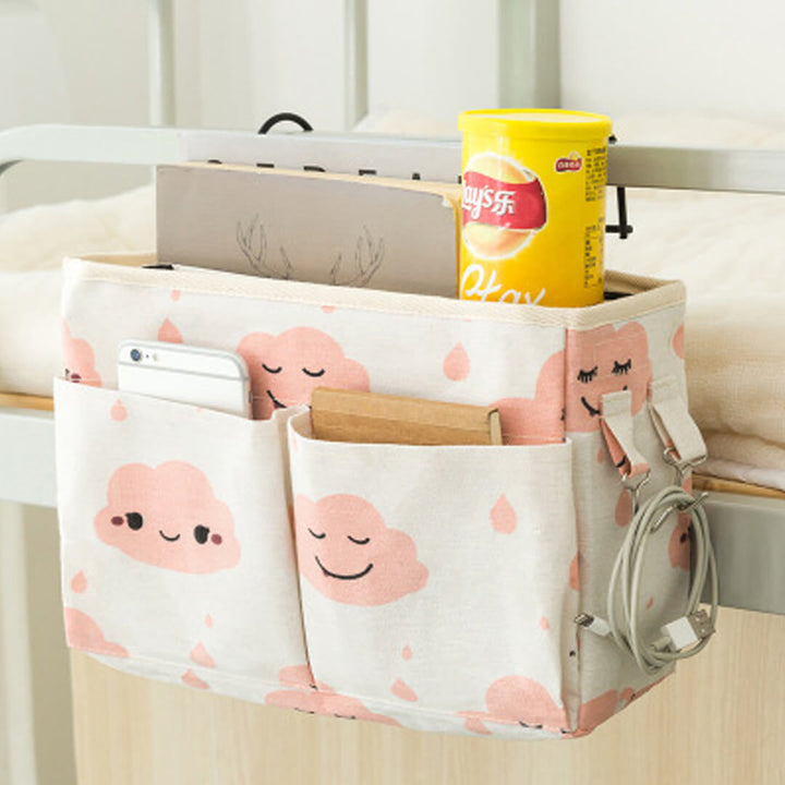 Pink hanging bedside storage organizer with multi pockets