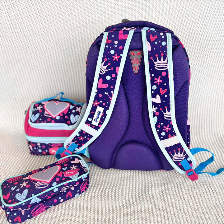 Heart and crown-themed girls school bag with mesh side pockets, back angle