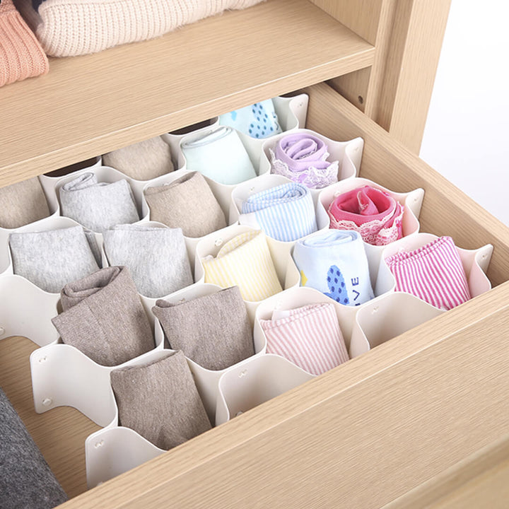 Plastic honeycomb drawer divider used for socks organization