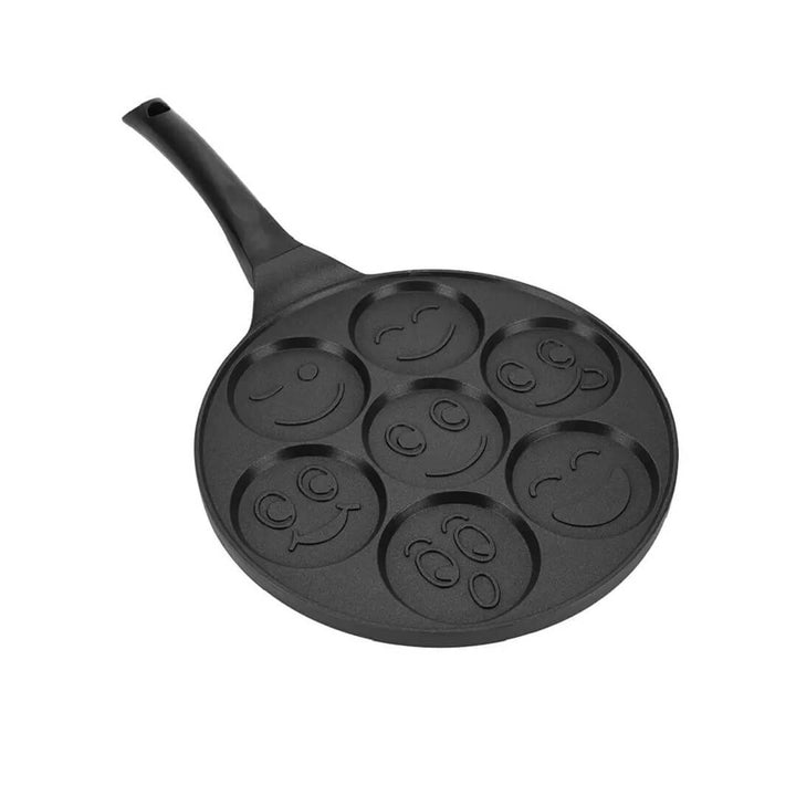 Smiley face pancake pan with seven molds for a fun breakfast