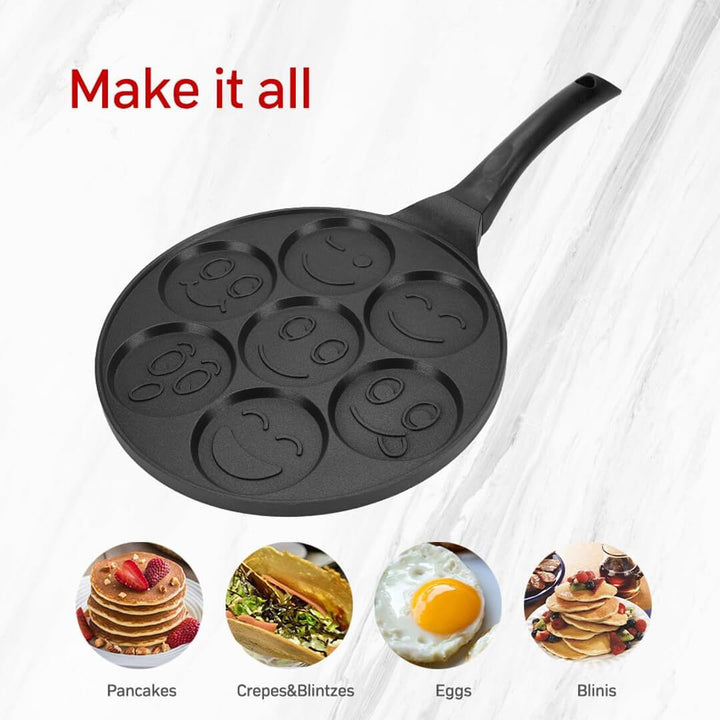 27cm griddle cooking seven smiley pancakes and eggs