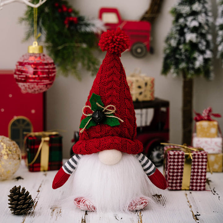 Handmade glowing Christmas gnome in red with tall knitted hat