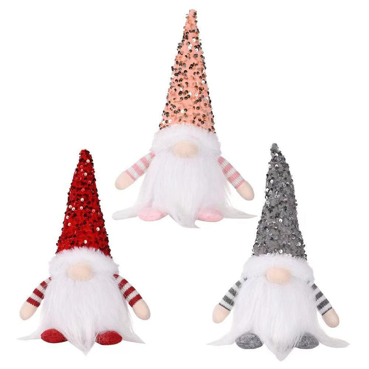 Trio of glitter gnomes in pink, red, and grey with sparkly hats