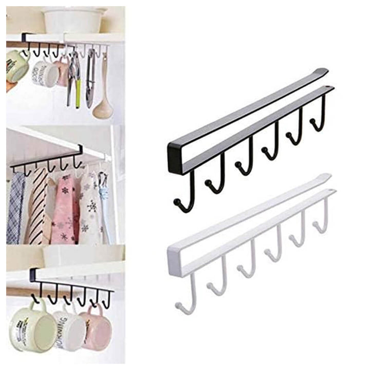 Set of black and white wall-mounted hooks with kitchen items
