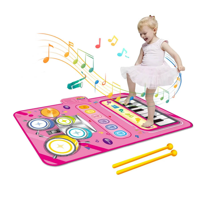 Child stepping on touch-sensitive piano mat for sound play
