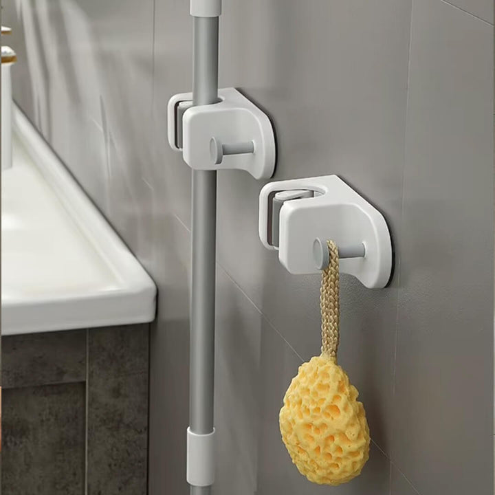 Adhesive mop holder wall-mounted for bathroom and kitchen