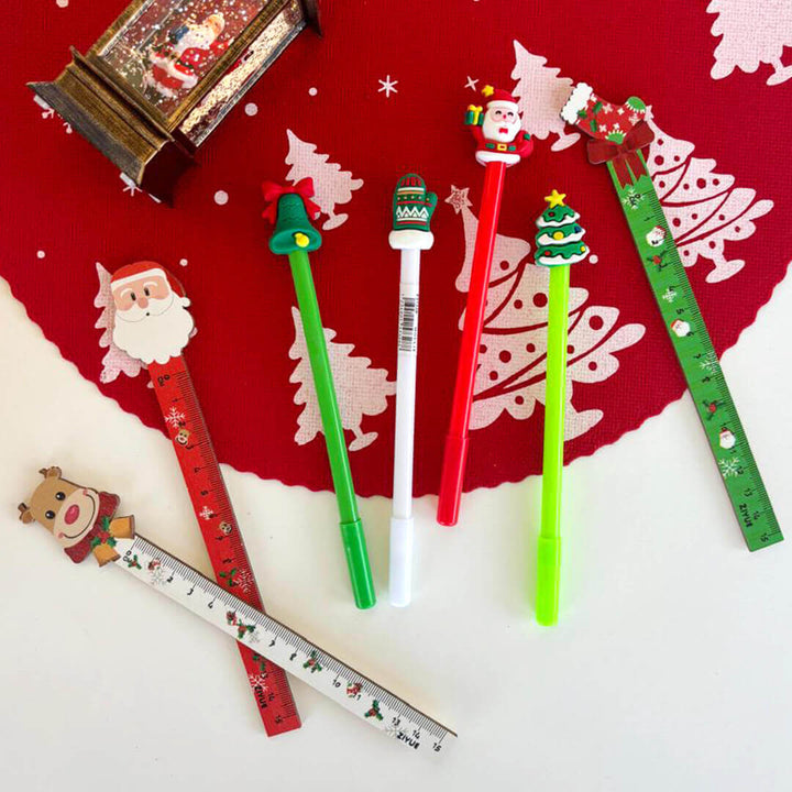 Set of Christmas-themed pens and a rulers for party favors