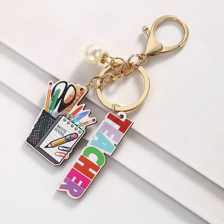 Wooden rainbow keychains for teachers, stationery holder design.