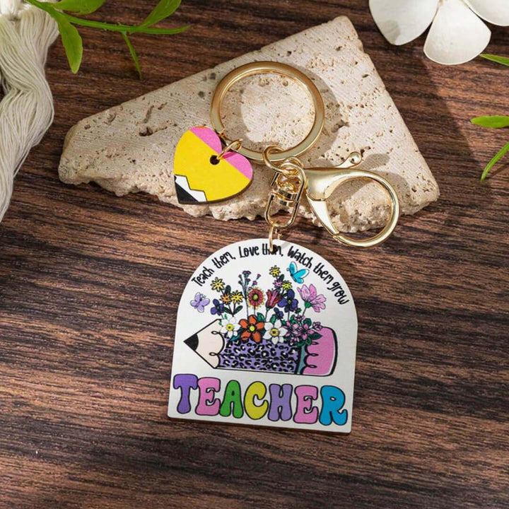 Wooden rainbow keychains for teachers, watch them grow message.