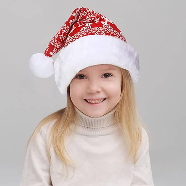Child aged 7+ wearing a red and white Christmas knit hat